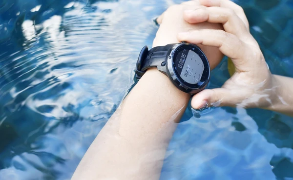 Smartwatch with 5ATM water resistance being worn during swimming workout